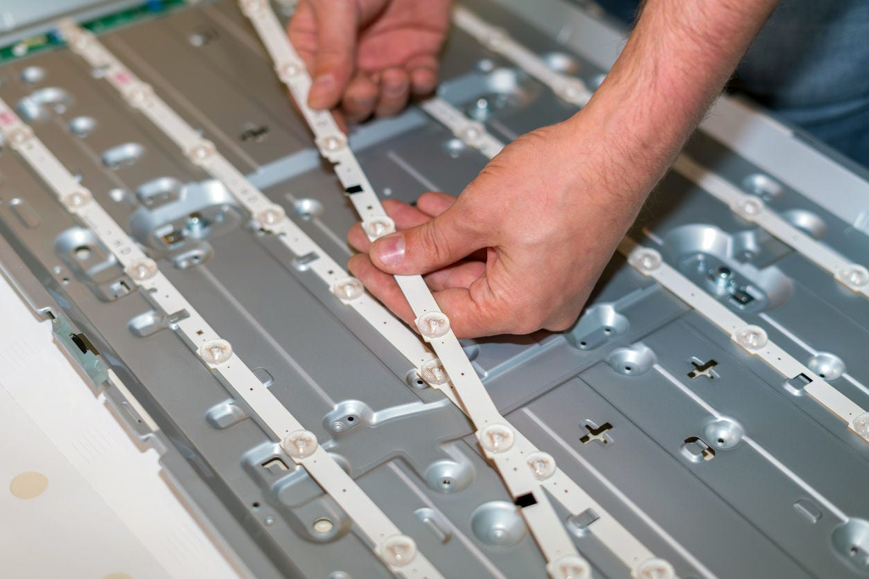 LCD TV repair, disassembly and replacement of LED backlight.
