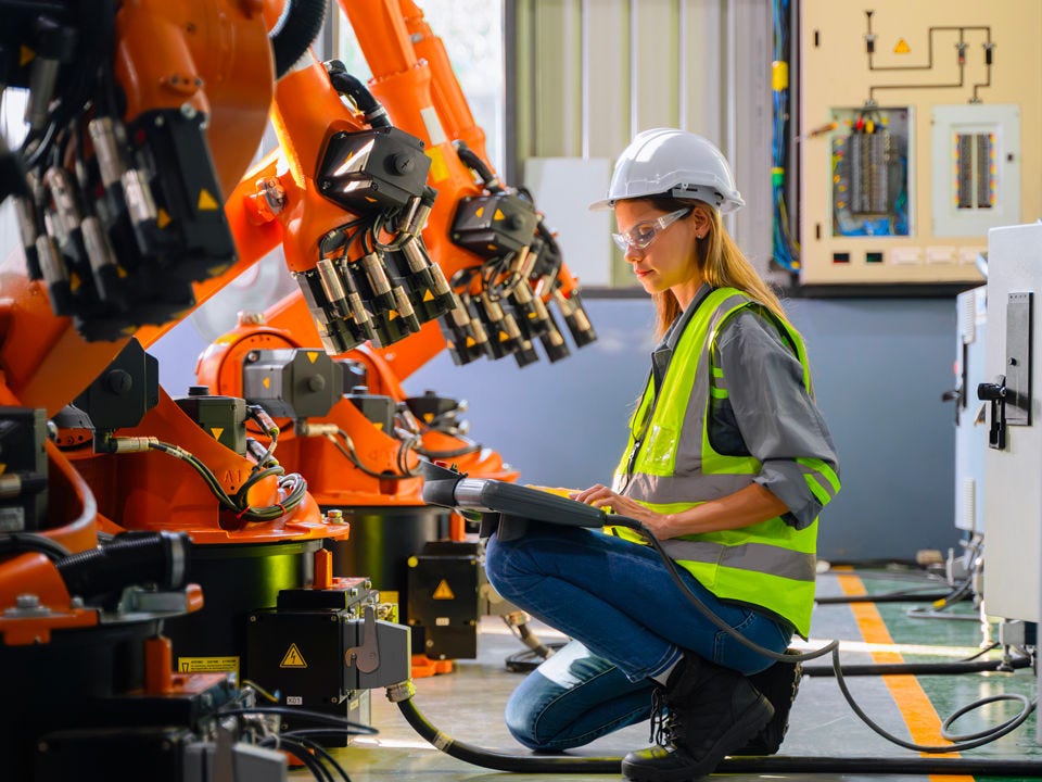 Engineer with robots